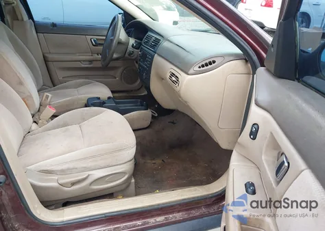 2000 Ford Taurus Lx z USA, uszkodzony, nr VIN 1FAFP52U3YA284478